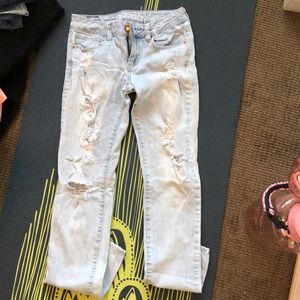 Washed out torn jeans